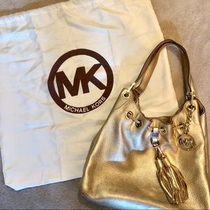 Michael Kors gold leather purse and dust bag